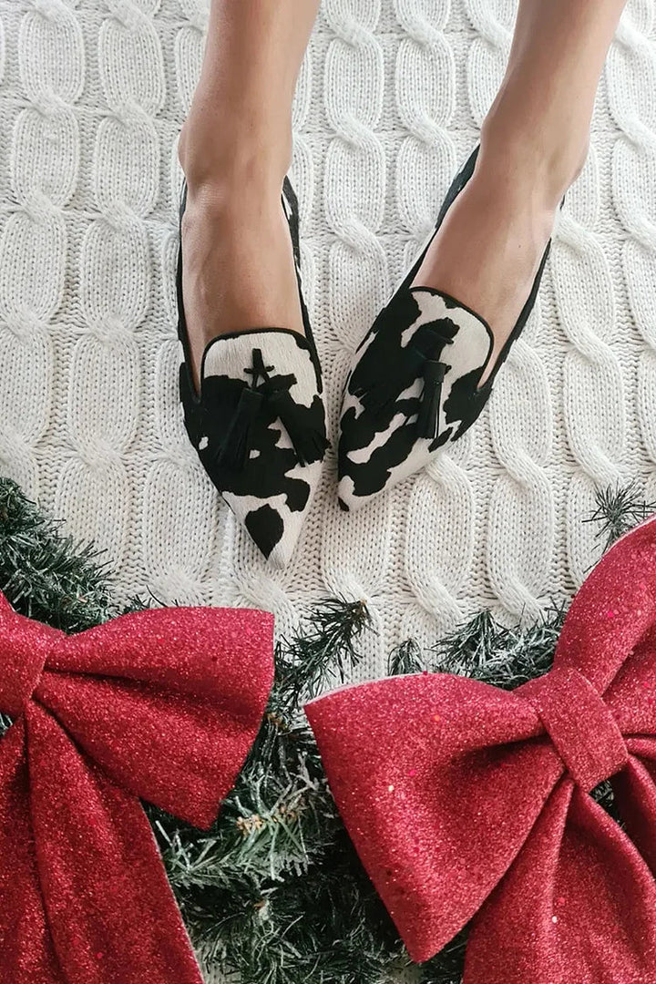 NORTHLINE STUDIO | COW PRINT LOAFERS WITH TASSEL