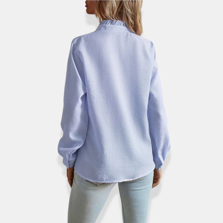 NORTHLINE STUDIO | RUFFLE TRIM BLOUSE
